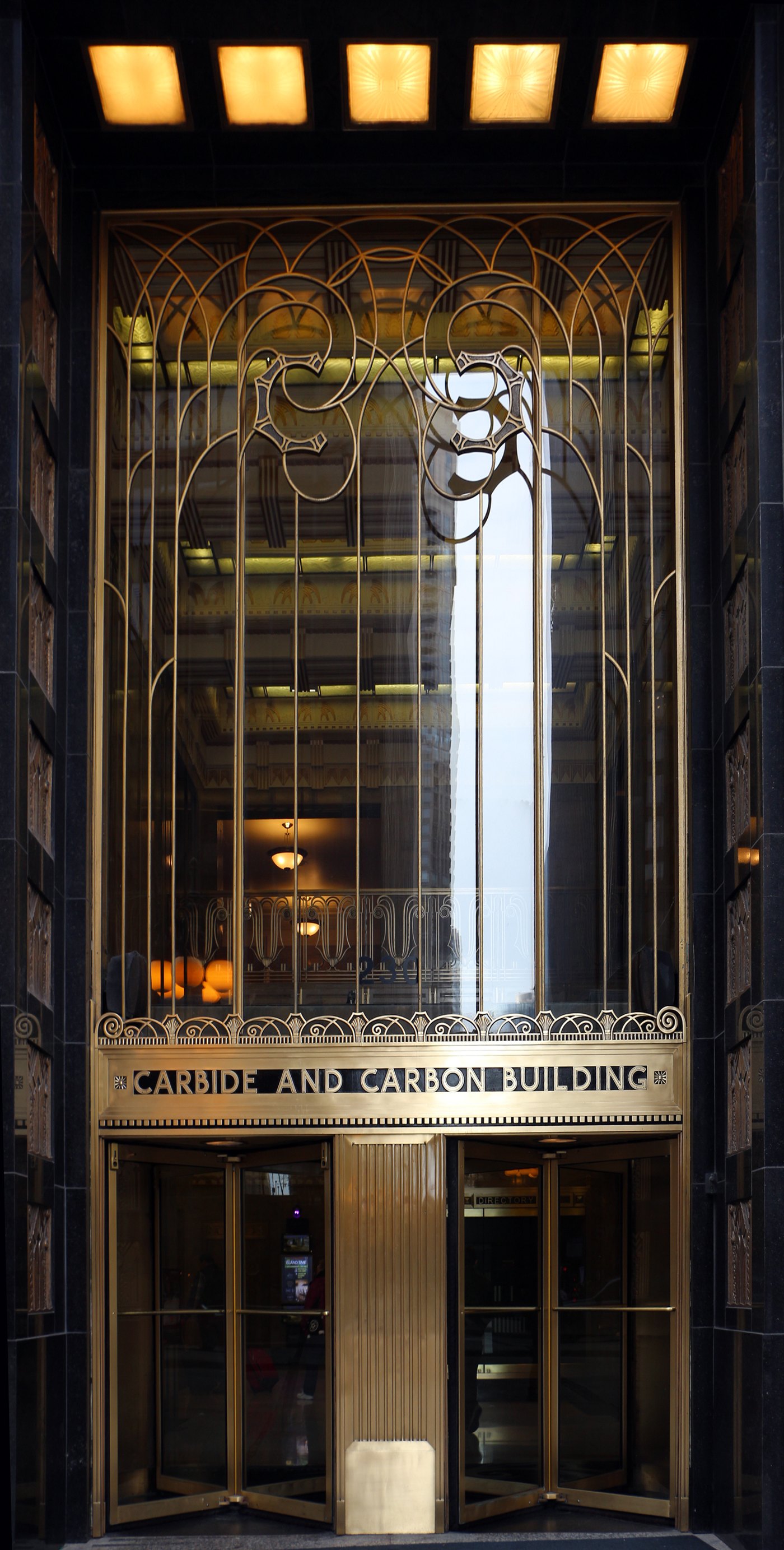 The bronze and granite entrance on Michigan Avenue